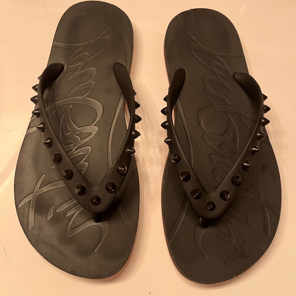 Authentic Christian Louboutin studded flip flops